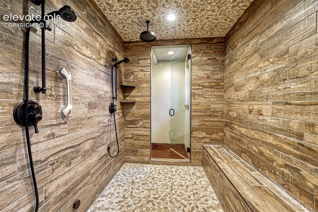 Image 20 of 50: Steam Shower in Primary Bathroom
