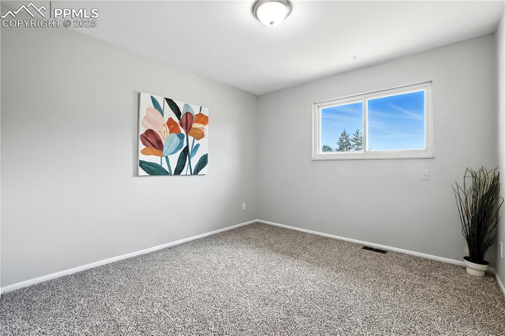 Image 13 of 36: Bedroom