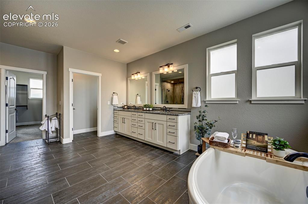 Image 37 of 50: Spacious & Relaxing primary bathroom.