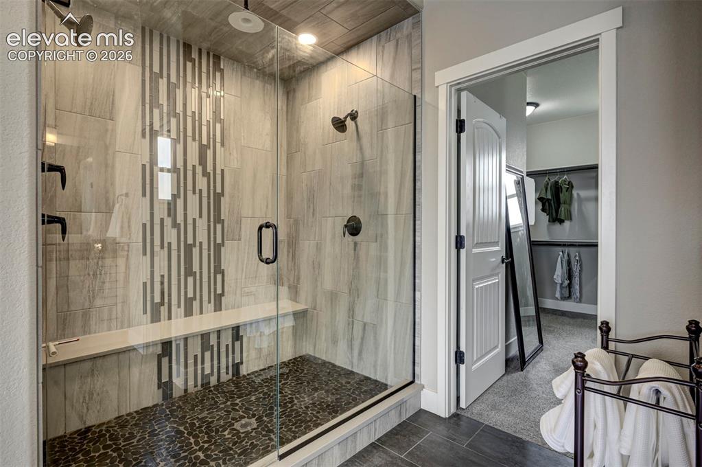 Image 39 of 50: Double Shower Heads with a Rain Head & it comes with a WiFi speaker.