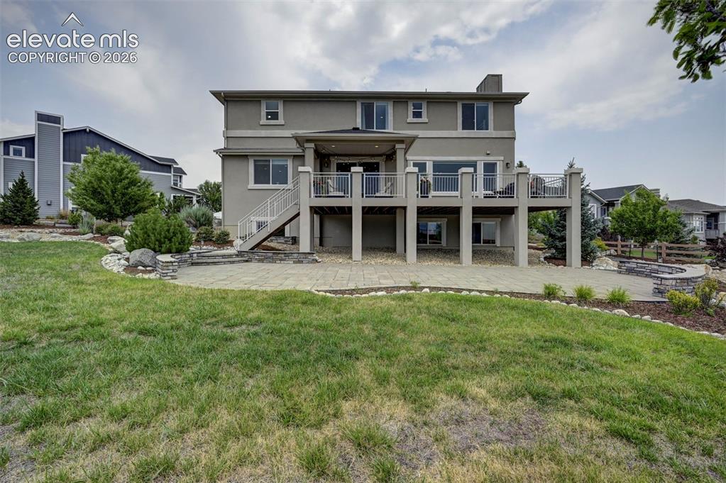 Image 50 of 50: Massive lot and outside spaces to host gatherings on the deck, the patio be