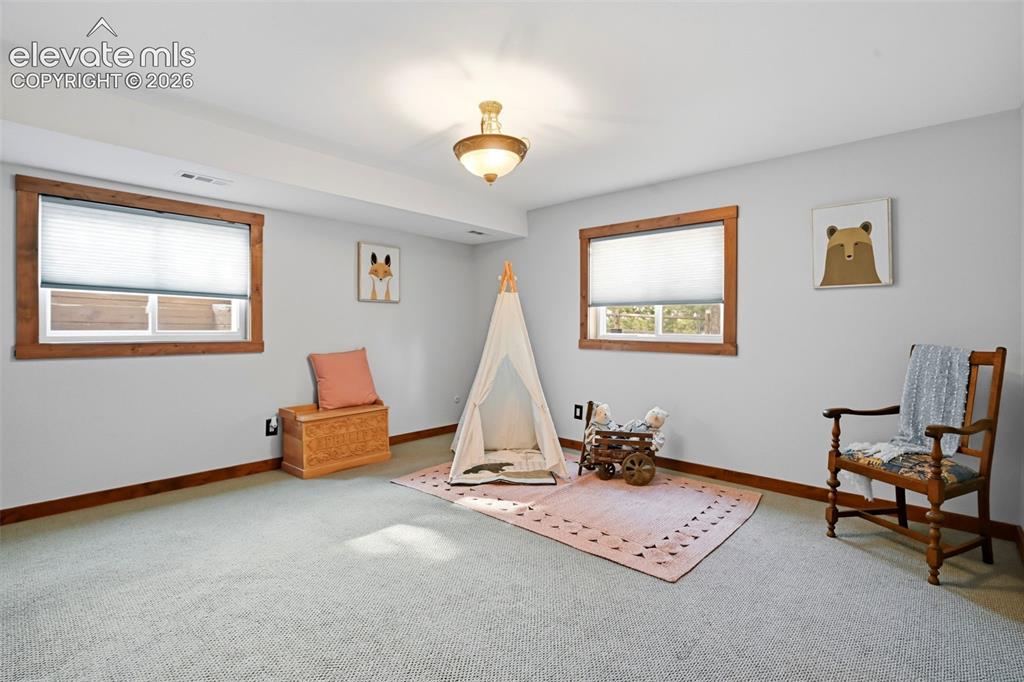 Image 30 of 50: This is fourth room in the house, the second bedroom on the mid level, with