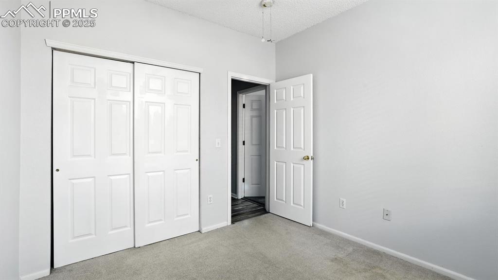 Image 14 of 26: Bedroom #2 has a generous closet.