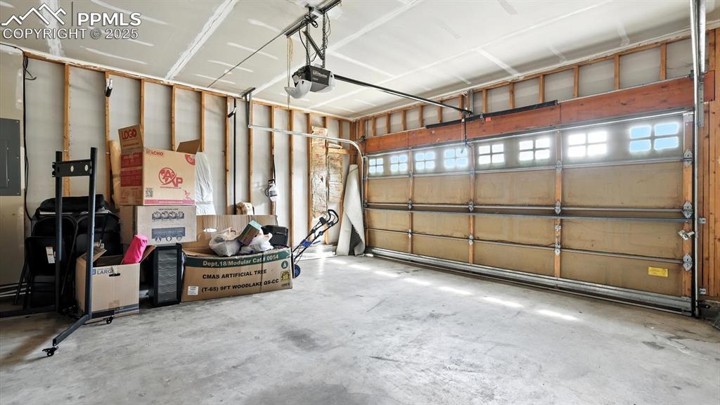 Image 25 of 26: 2-car attached garage.