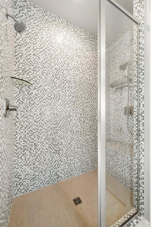 Image 27 of 49: Full bath featuring a stall shower