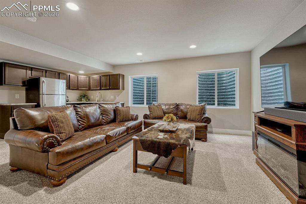 Image 36 of 50: The Finished Basement offers exceptional flexibility with a Family Room and
