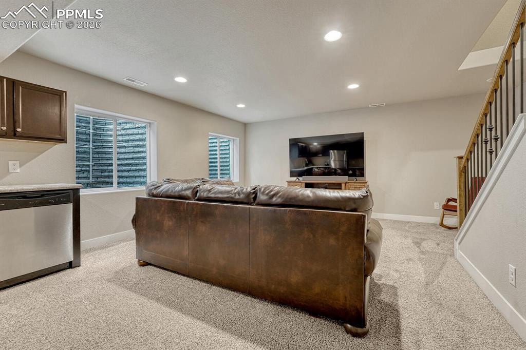 Image 37 of 50: Basement Family Room.