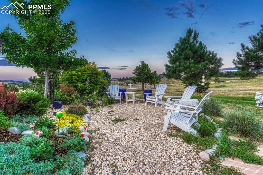 Image 10 of 45: Sitting on 2.5 acres, you’ll find several outdoor living spaces tucked in a