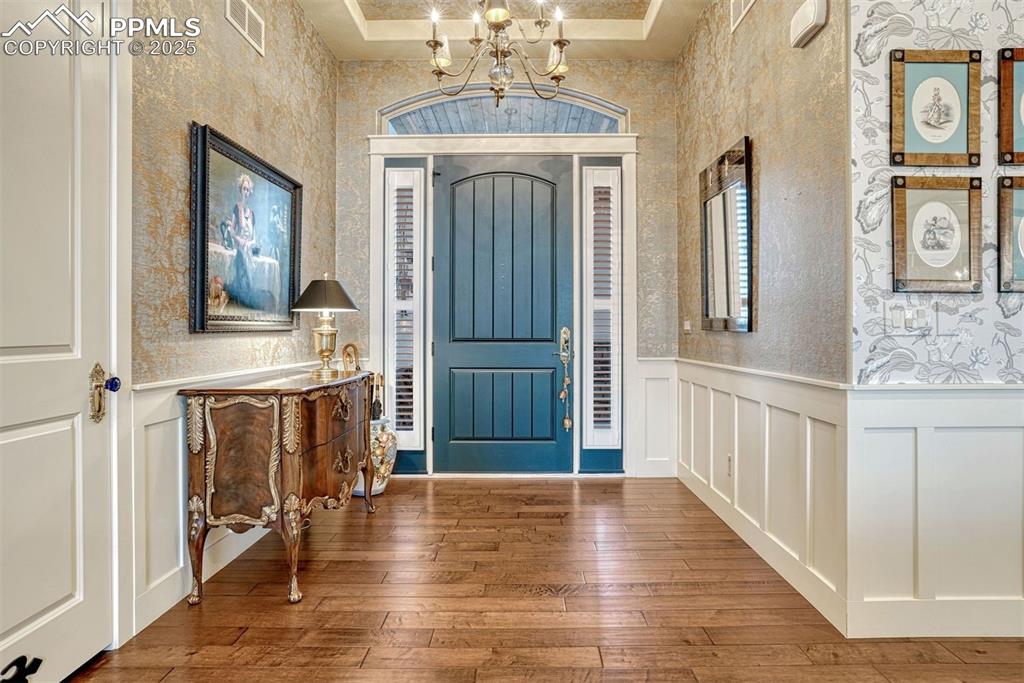 Image 12 of 45: From the moment you step inside, you’ll delight in the gleaming wood floors