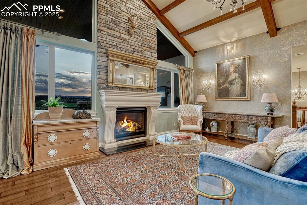 Image 13 of 45: Gather in the great room for evenings around the fire with family and guest