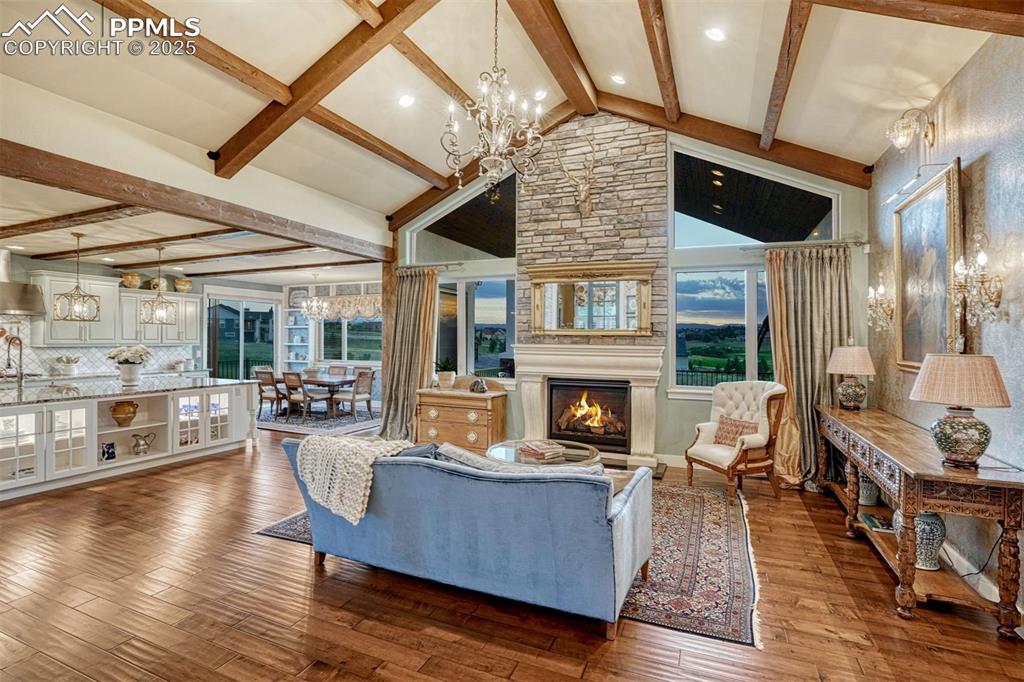 Image 14 of 45: Manor meets modern in this spacious open concept living, dining and kitchen