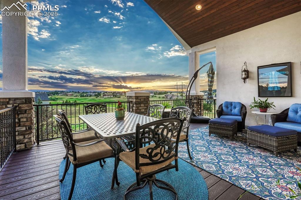 Image 18 of 45: From the main level deck, enjoy mountain & golf course views…and those suns