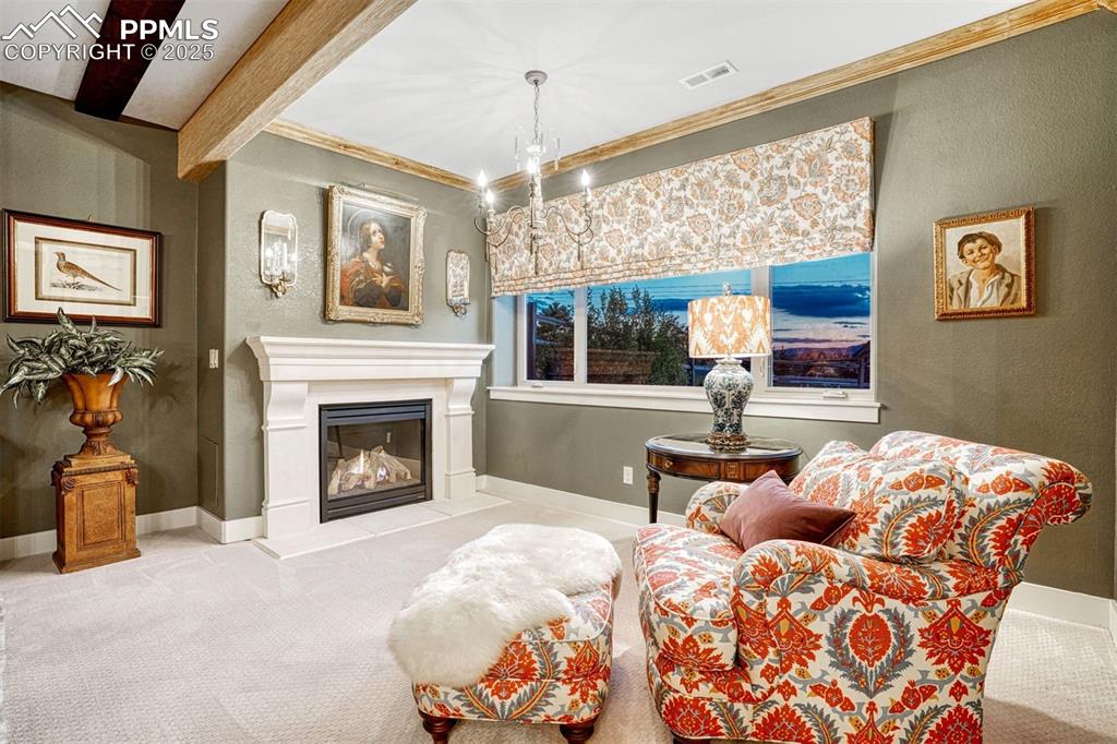Image 30 of 45: Curl up and relax in front of the fire. Another place destined to become a