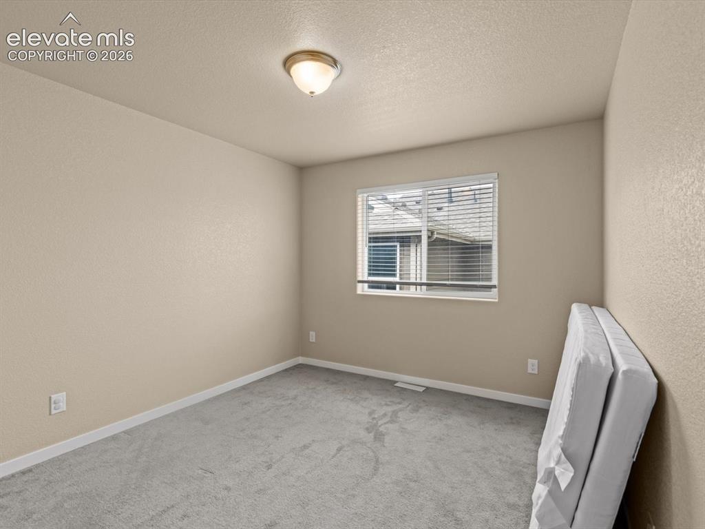 Image 35 of 45: Third upstairs bedroom