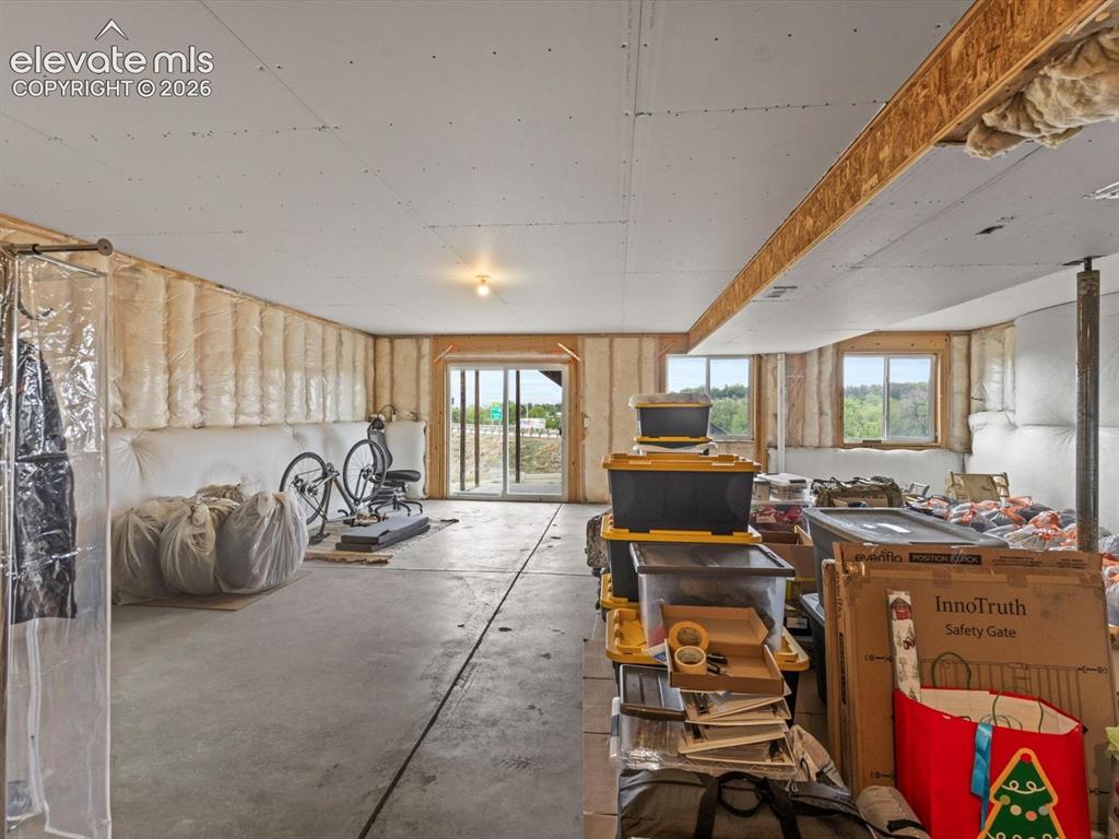 Image 37 of 45: Huge basement with walkout.