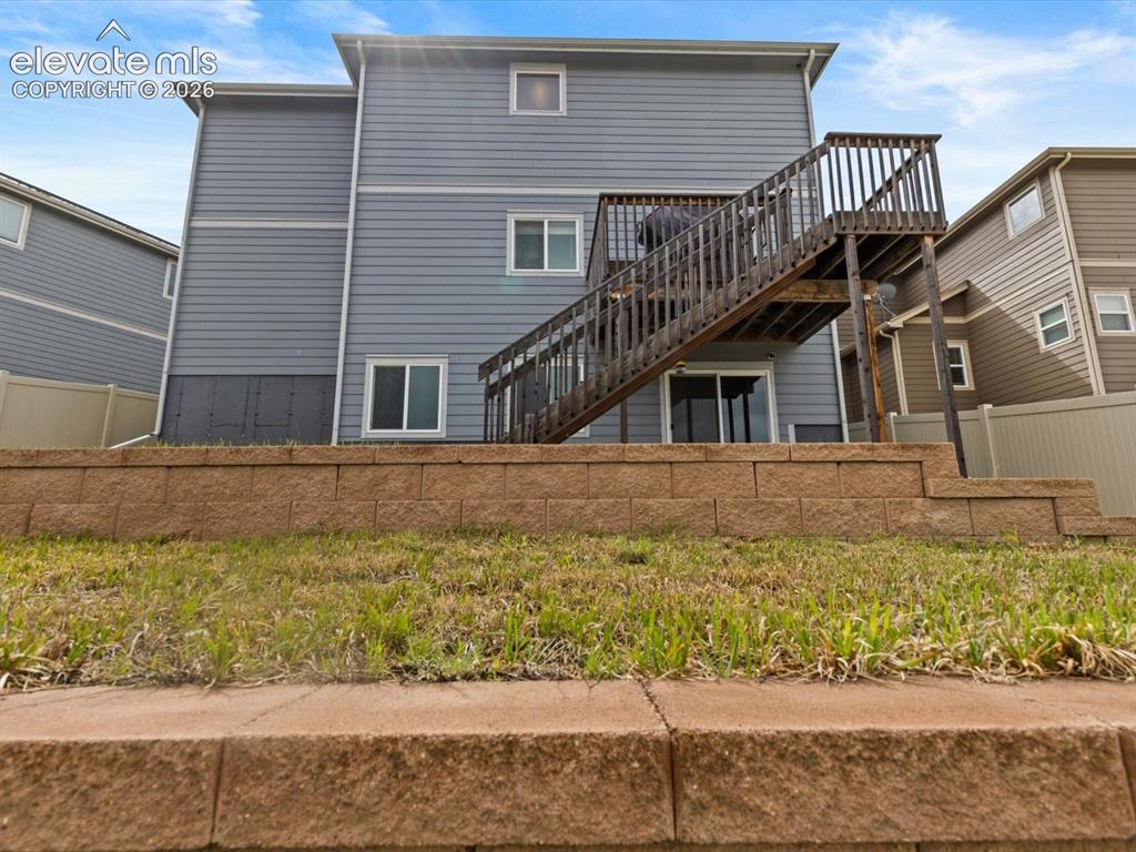 Image 41 of 45: Multi-level retaining wall featuring tiered stone blocks