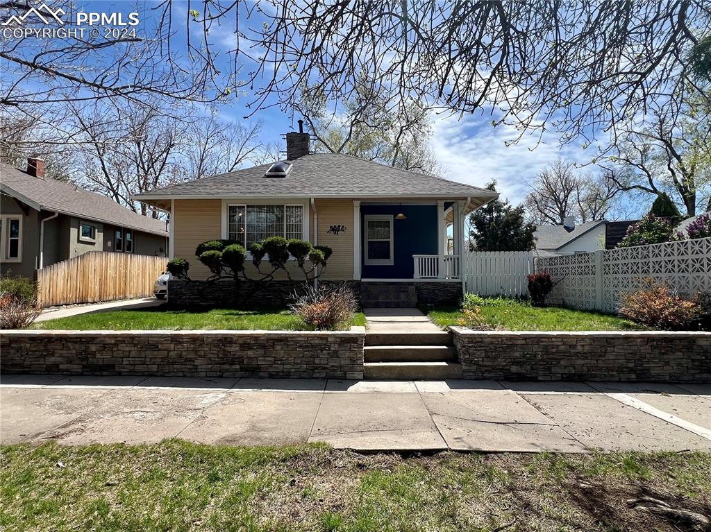 Image 2 of 18: Bungalow-style home featuring covered porch
