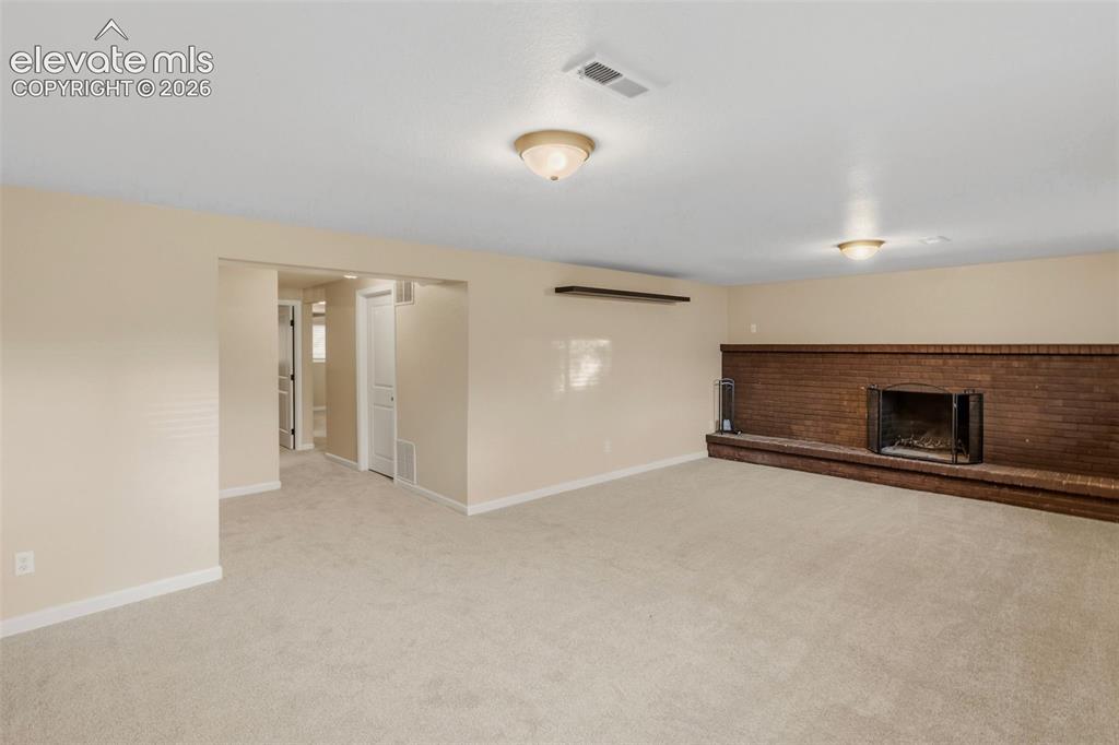 Image 32 of 49: Lower Level Family Room