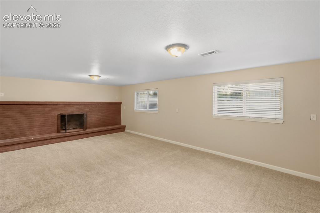 Image 33 of 49: Lower Level Family Room