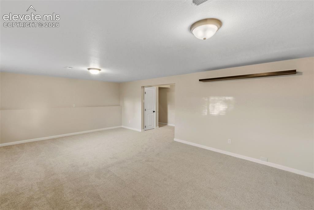 Image 34 of 49: Lower Level Family Room