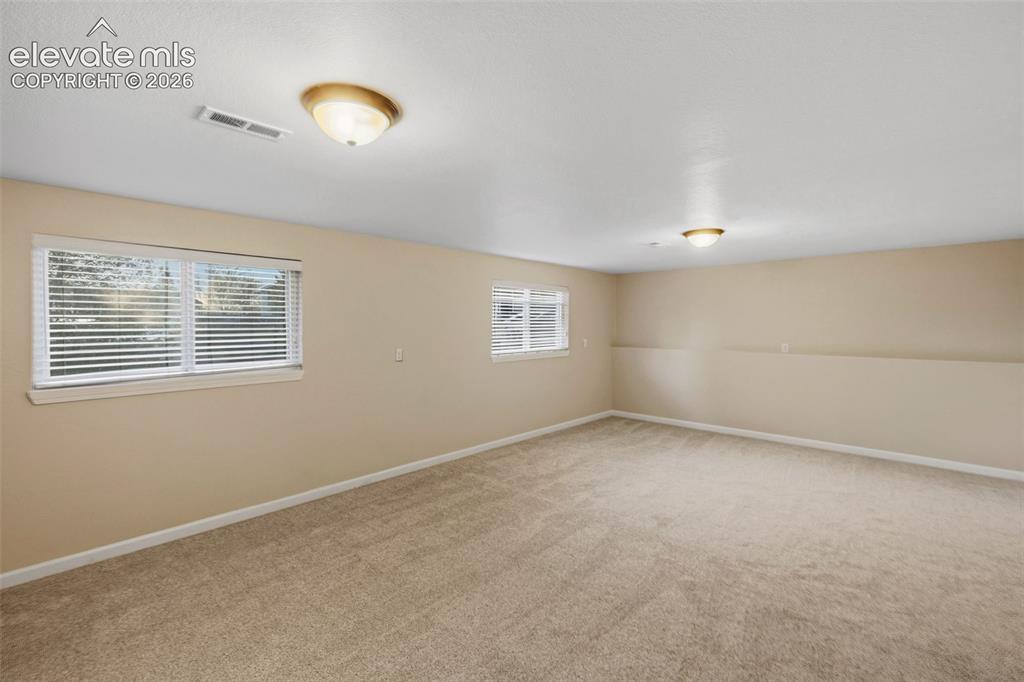 Image 35 of 49: Lower Level Family Room