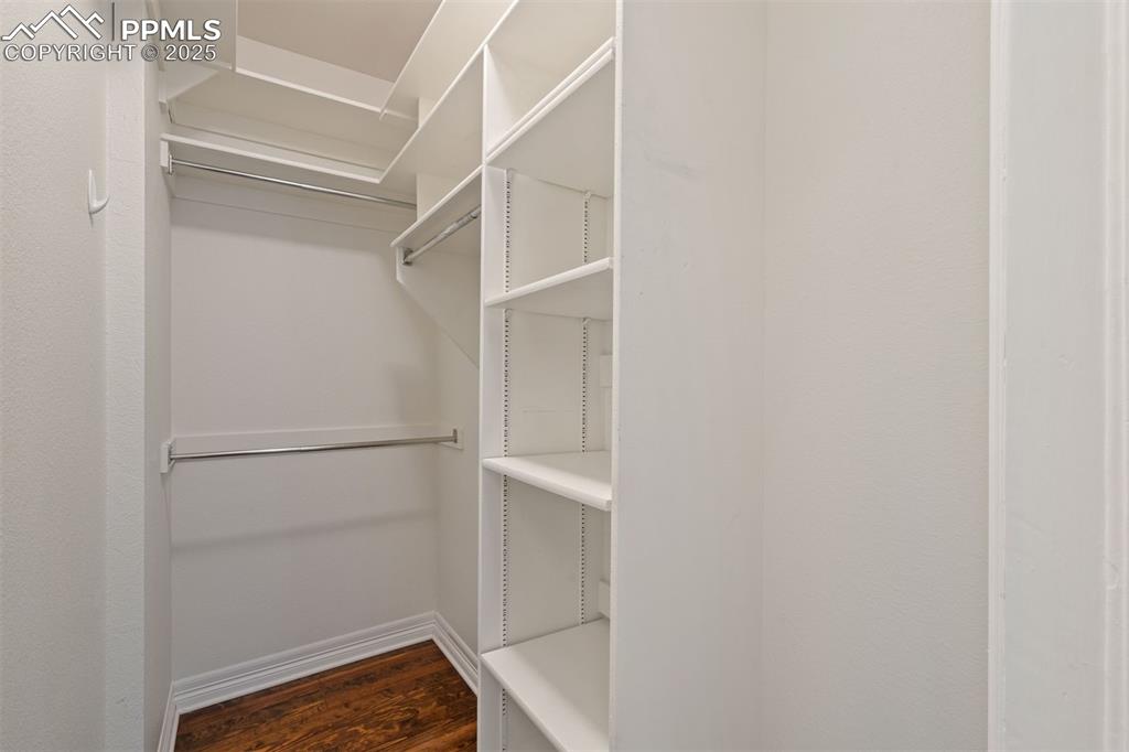 Image 15 of 32: Spacious walk in closet.