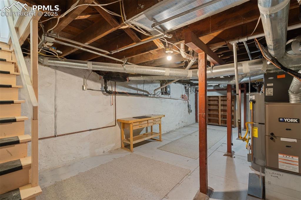 Image 29 of 32: The basement is clean with alot of storage space. The furnace was replaced 