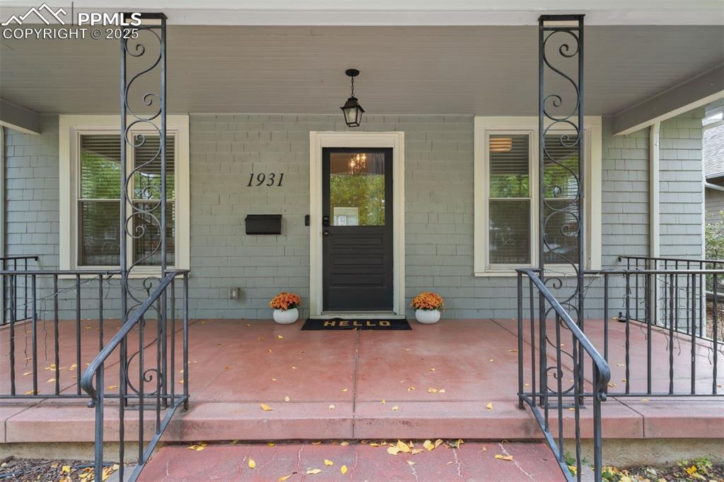 Image 3 of 32: Enjoy the covered front porch for watching the sunset.