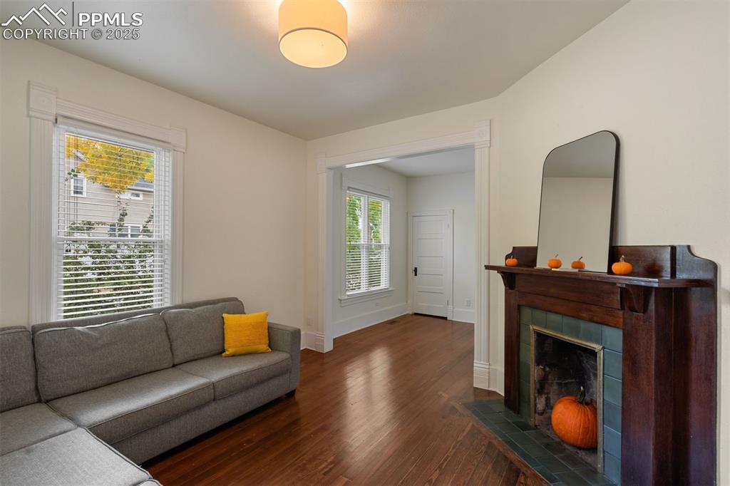 Image 5 of 32: Certified Van Briggle tile surrounds the decorative fireplace.