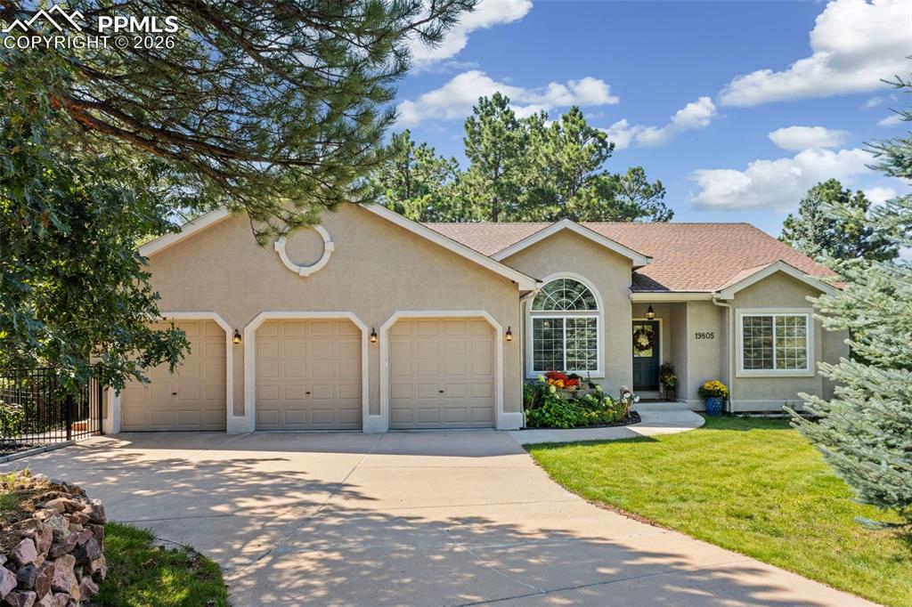 Image 1 of 50: Elegant ranch-style home in prestigious Woodmoor neighborhood