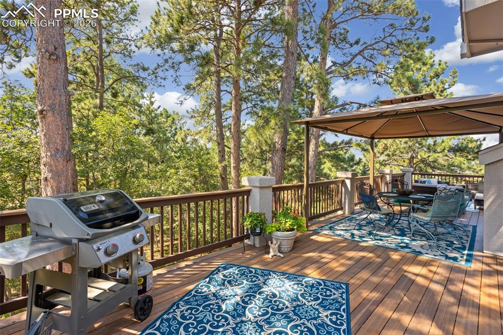 Image 16 of 50: Expand your space to this walkout to deck from kitchen