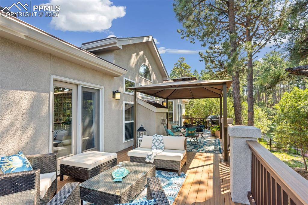 Image 19 of 50: Deck space outside primary bedroom