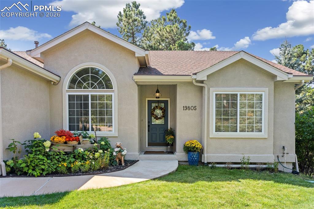 Image 2 of 50: Charming front entrance to welcome you home!