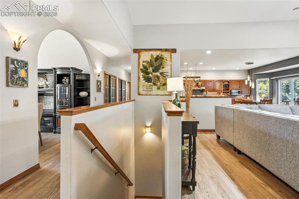 Image 24 of 50: Another whole house awaits down these stairs