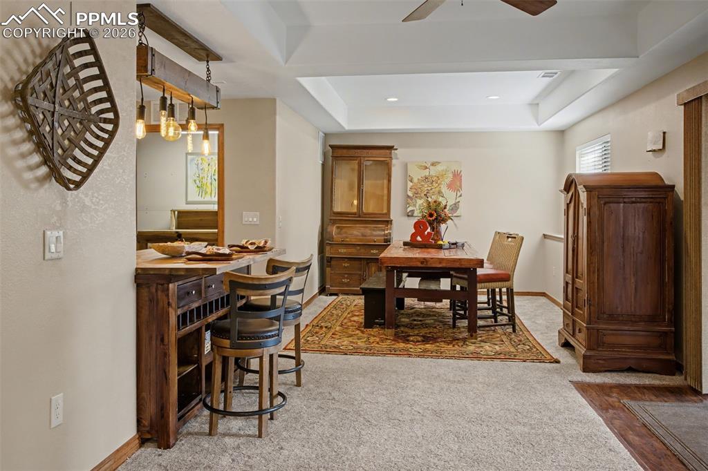 Image 27 of 50: Formal dining area in basement.