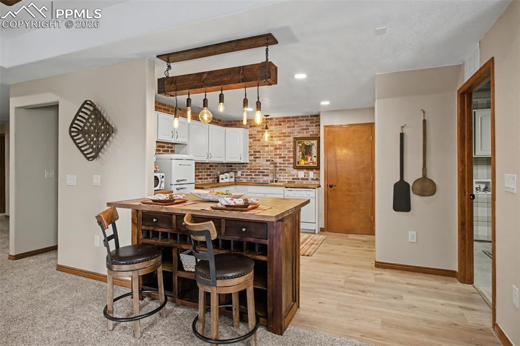 Image 29 of 50: New Kitchenette in basement.