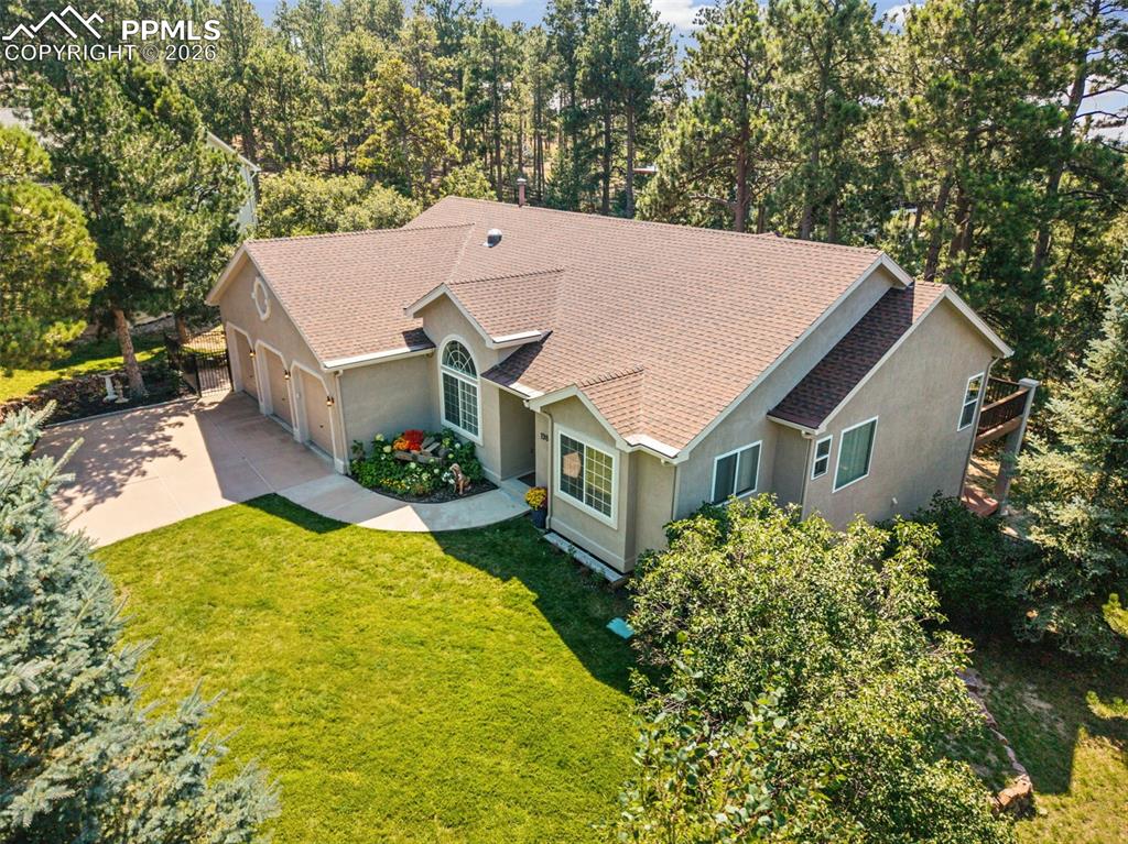 Image 3 of 50: Surrounded by mature pines, aspen and scrub oak for ultimate privacy.  