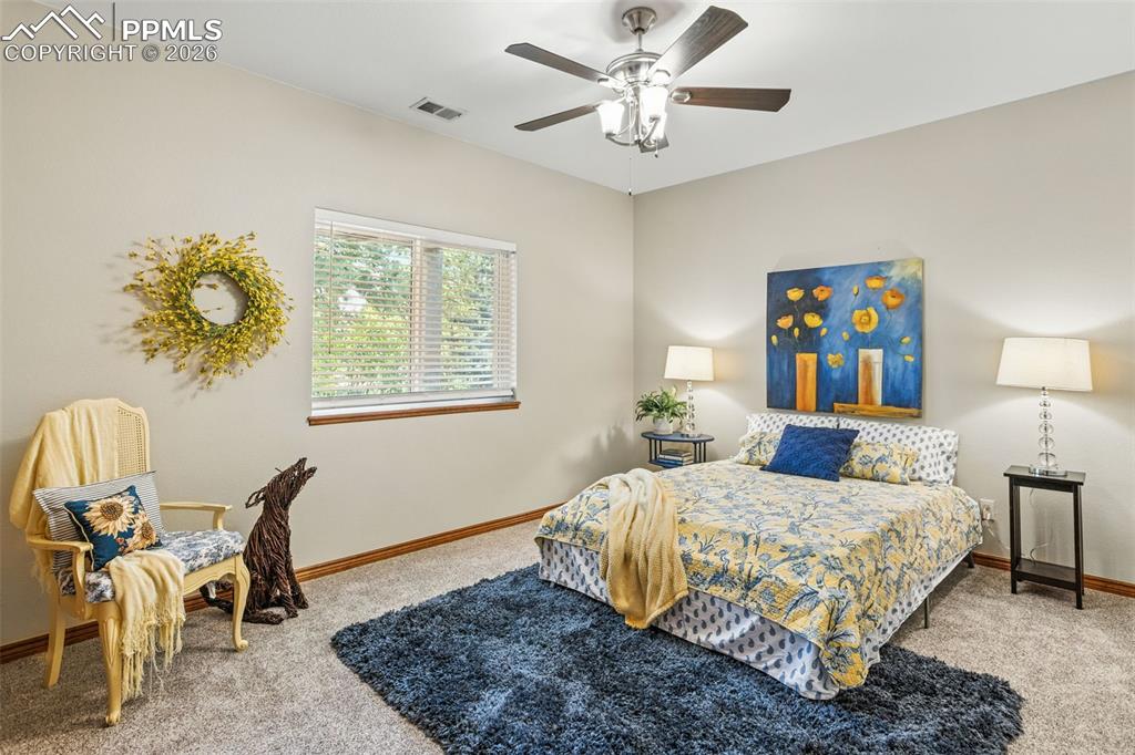 Image 33 of 50: Bed #3 with above-ground window & ceiling fan.  