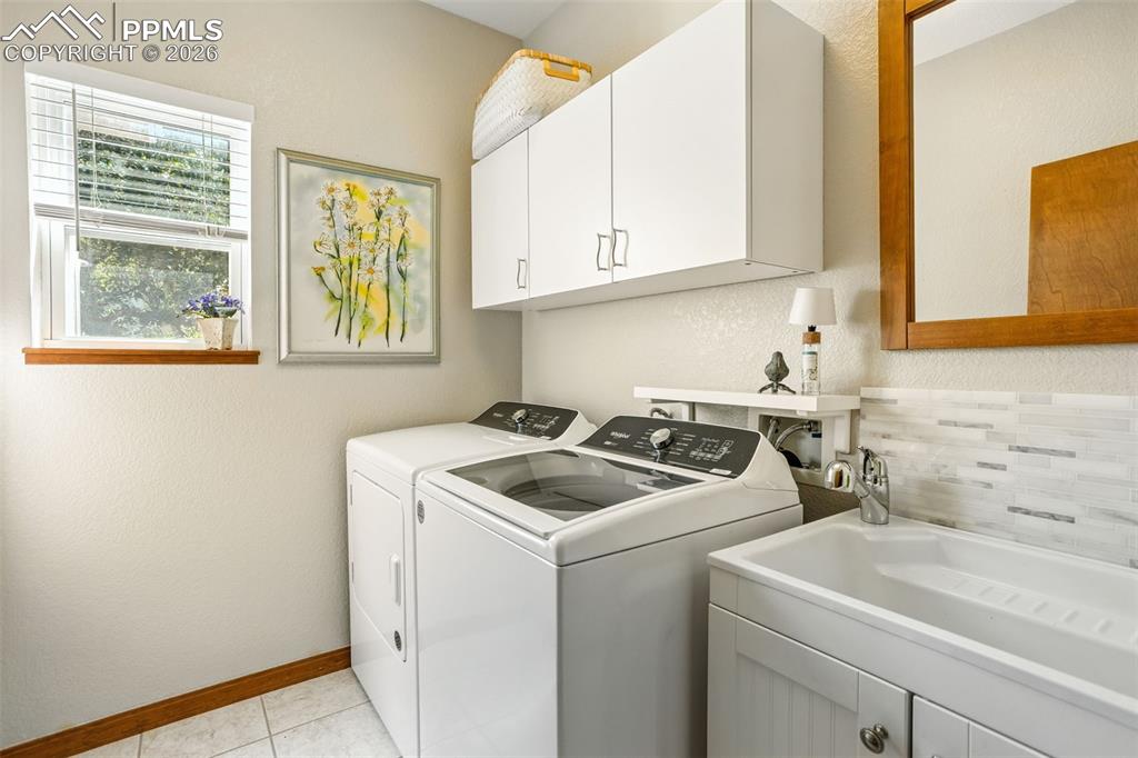 Image 38 of 50: Laundry room #1 on main floor w/utility sink