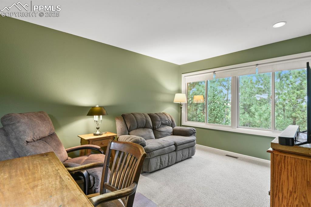 Image 31 of 50: Carpeted office featuring baseboards