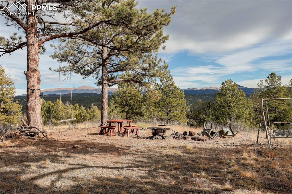 Image 12 of 22: View of yard with a mountain view