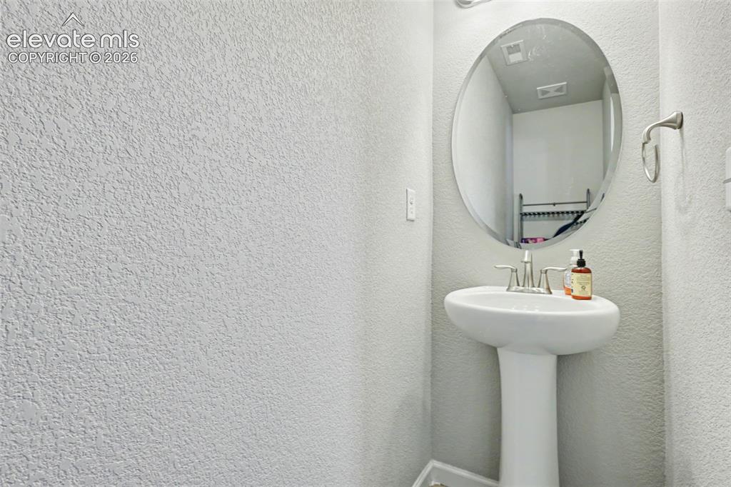 Image 14 of 26: The washer and dyer are conveniently located near the upstairs bedrooms!