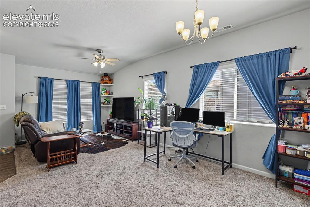 Image 7 of 26: The Dining Area, currently being utilized as an office, is conveniently loc