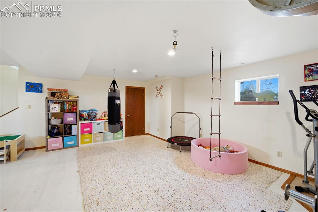 Image 22 of 37: Playroom with baseboards