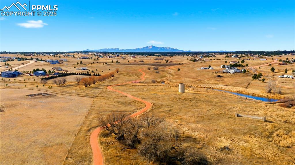 Image 35 of 37: Overview of rural landscape featuring a desert landscape and mountains