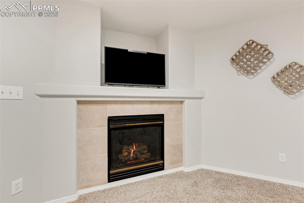 Image 33 of 43: 2nd Cozy Gas Fireplace in Basement