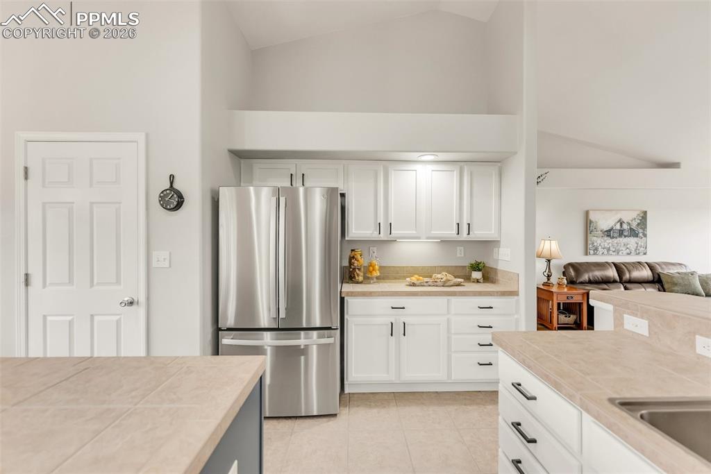 Image 4 of 43: Very Large, open kitchen features a Stainless Steel Refrigerator