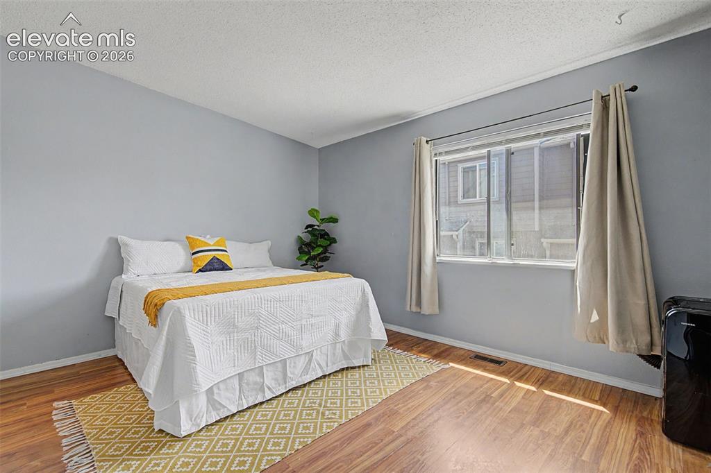 Image 20 of 27: Master Bedroom