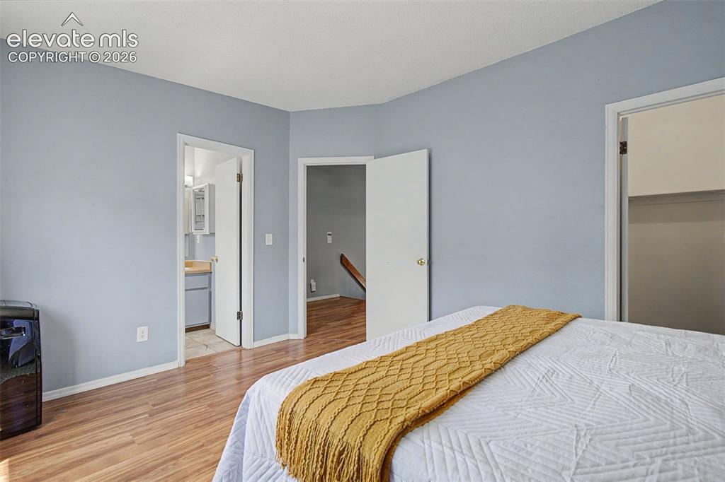 Image 21 of 27: Master Bedroom