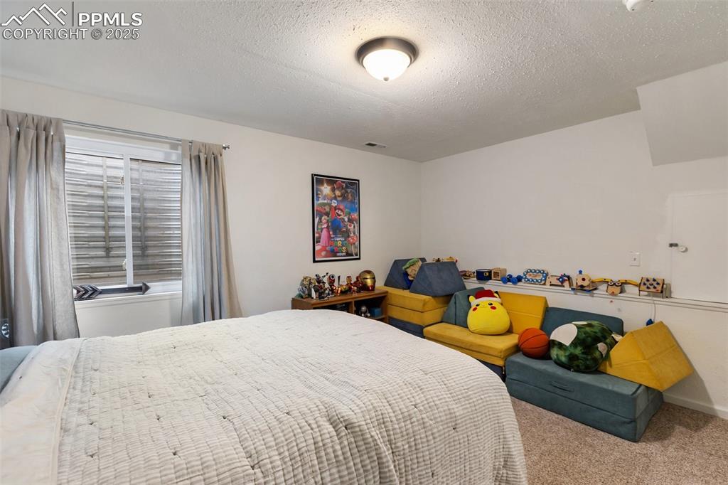 Image 21 of 29: Bedroom